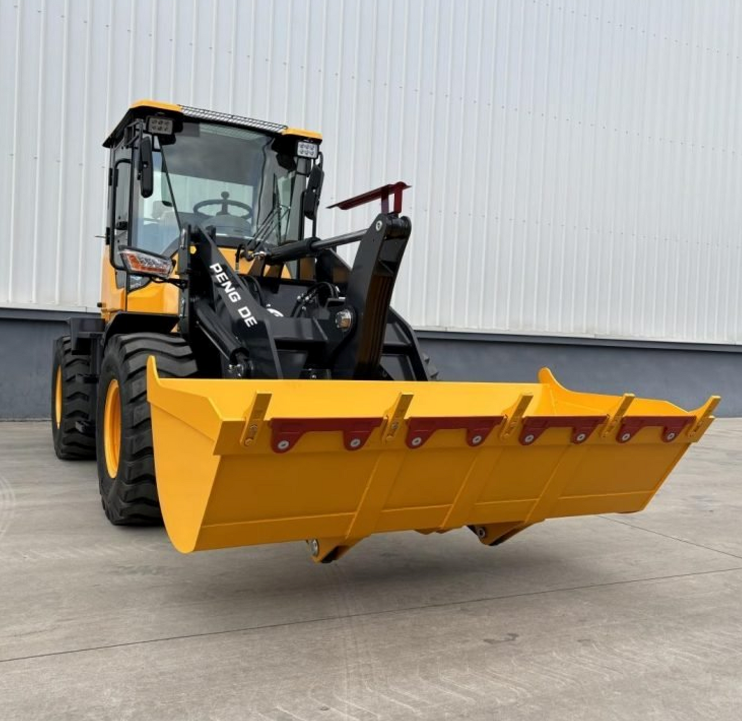 U & Me Traders: Yellow Loader with a large blade available in Pakistan