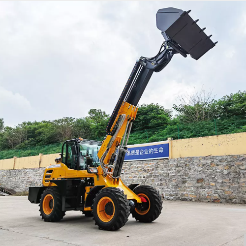 Yellow wheel loader with a large black bucket: U & Me Traders